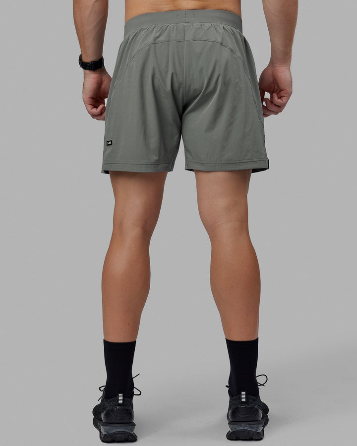 Man wearing Challenger 6&quot; Lined Performance Short - Graphite
