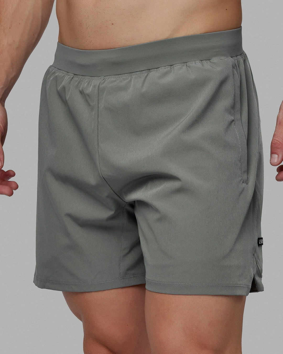 Man wearing Challenger 6" Lined Performance Short - Graphite