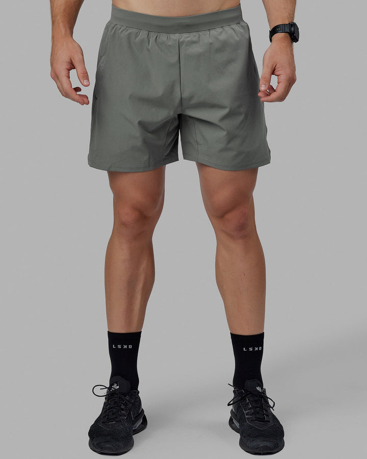 Man wearing Challenger 6&quot; Lined Performance Short - Graphite
