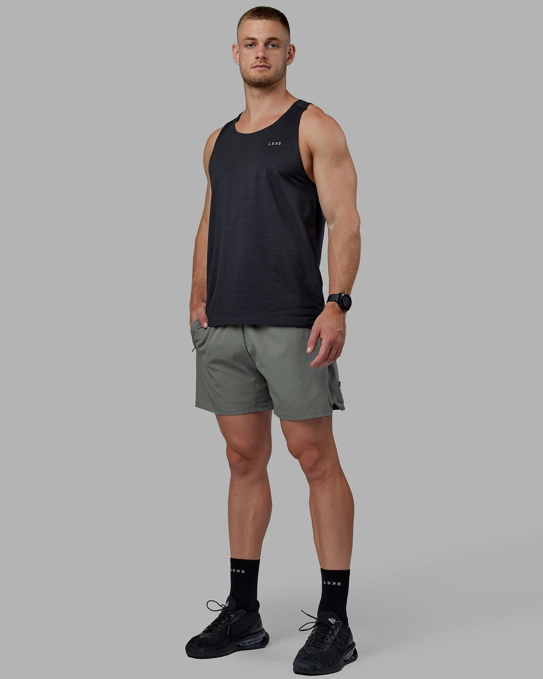 Man wearing Challenger 6&quot; Lined Performance Short - Graphite