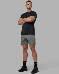 Man wearing Challenger 6" Performance Short - Graphite