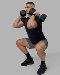 Man wearing Challenger 6" Performance Short - Graphite