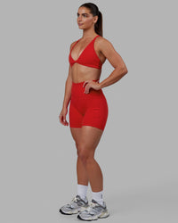 Woman wearing Fusion Ultra High-Rise 6" Short Pockets - Infrared | Model:Annabelle | Size:S