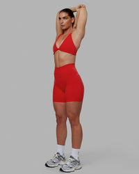 Woman wearing Fusion Ultra High-Rise 6" Short Pockets - Infrared | Model:Annabelle | Size:S