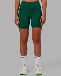 Woman wearing Fusion Ultra High-Rise 6" Short Pockets - Malachite | Model:Sophie | Size:S