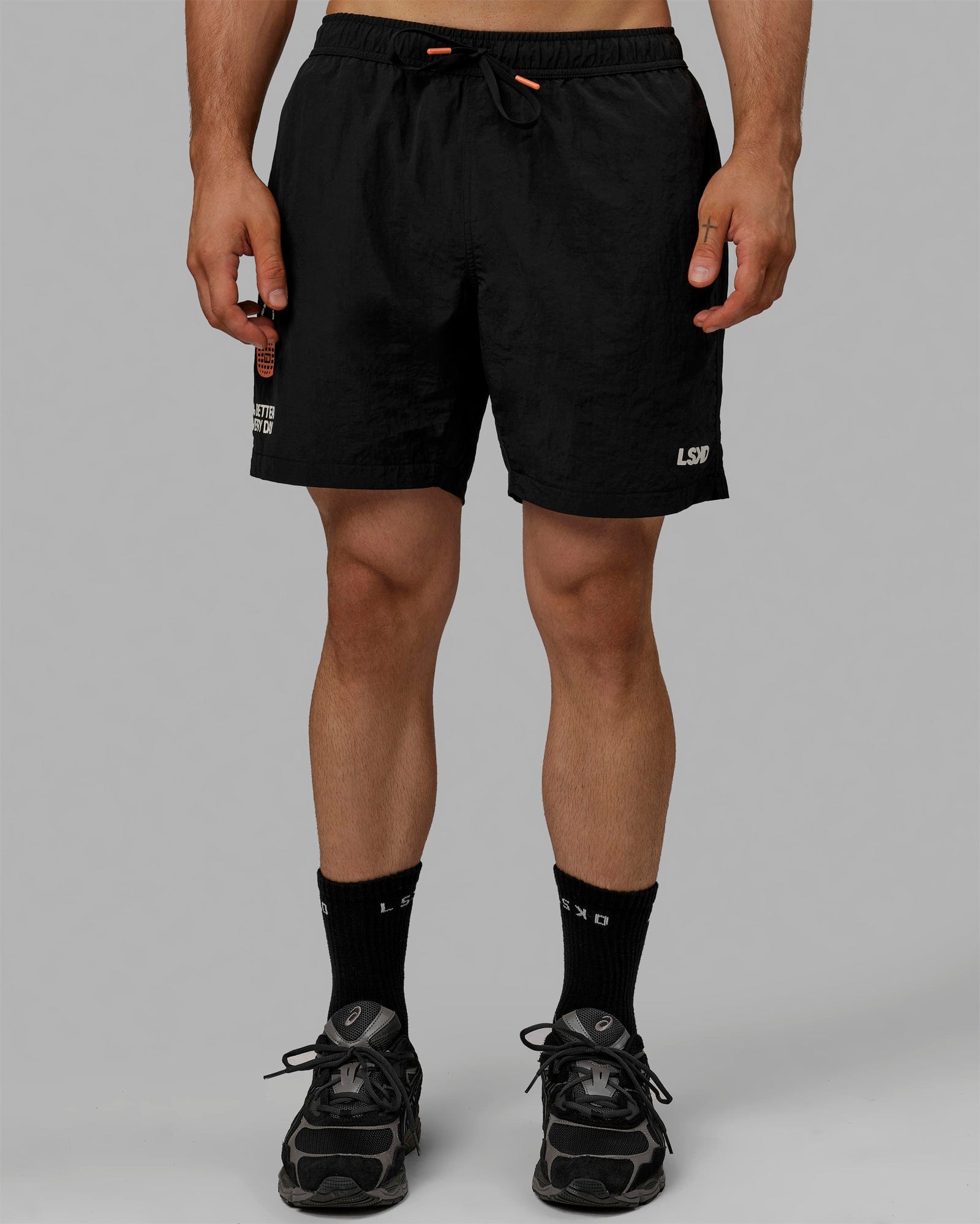 Man wearing Millennium 7" Shorts - Black