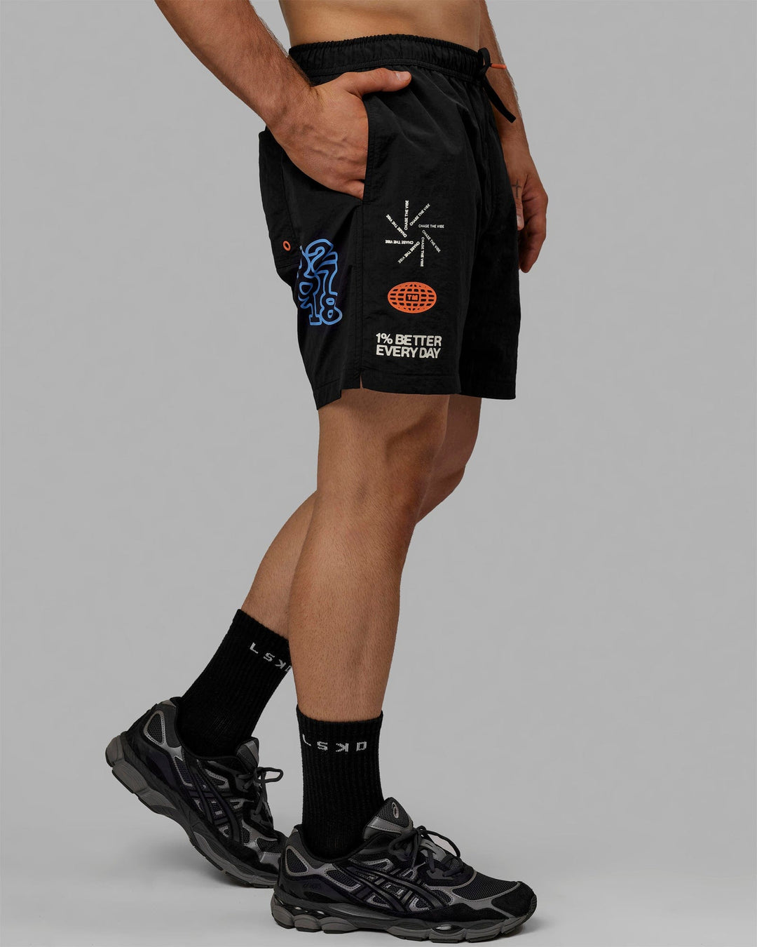 Man wearing Millennium 7" Shorts - Black