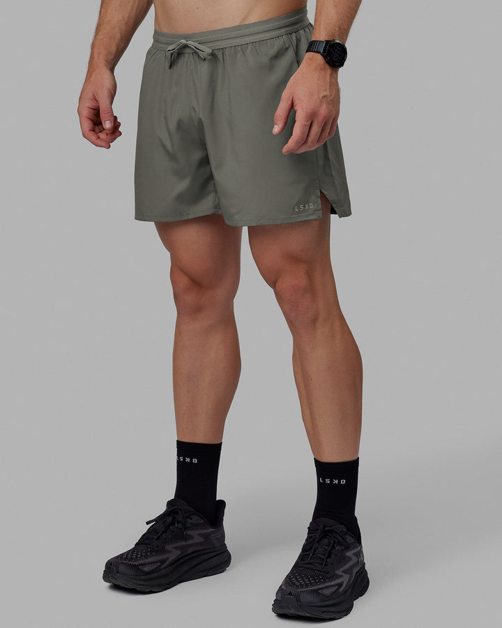 Man wearing Pace 5" Lined Performance Short - Graphite-Reflective