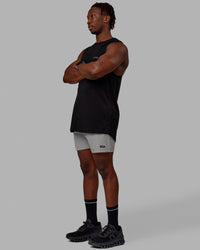 Man wearing Rep 5'' Performance Shorts - Ultimate Grey