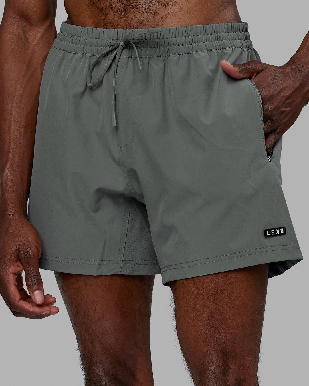 Man wearing Rep 5'' Performance Short - Graphite