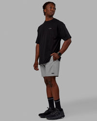 Man wearing Rep 7'' Performance Shorts - Ultimate Grey
