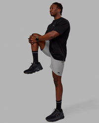 Man wearing Rep 7'' Performance Shorts - Ultimate Grey