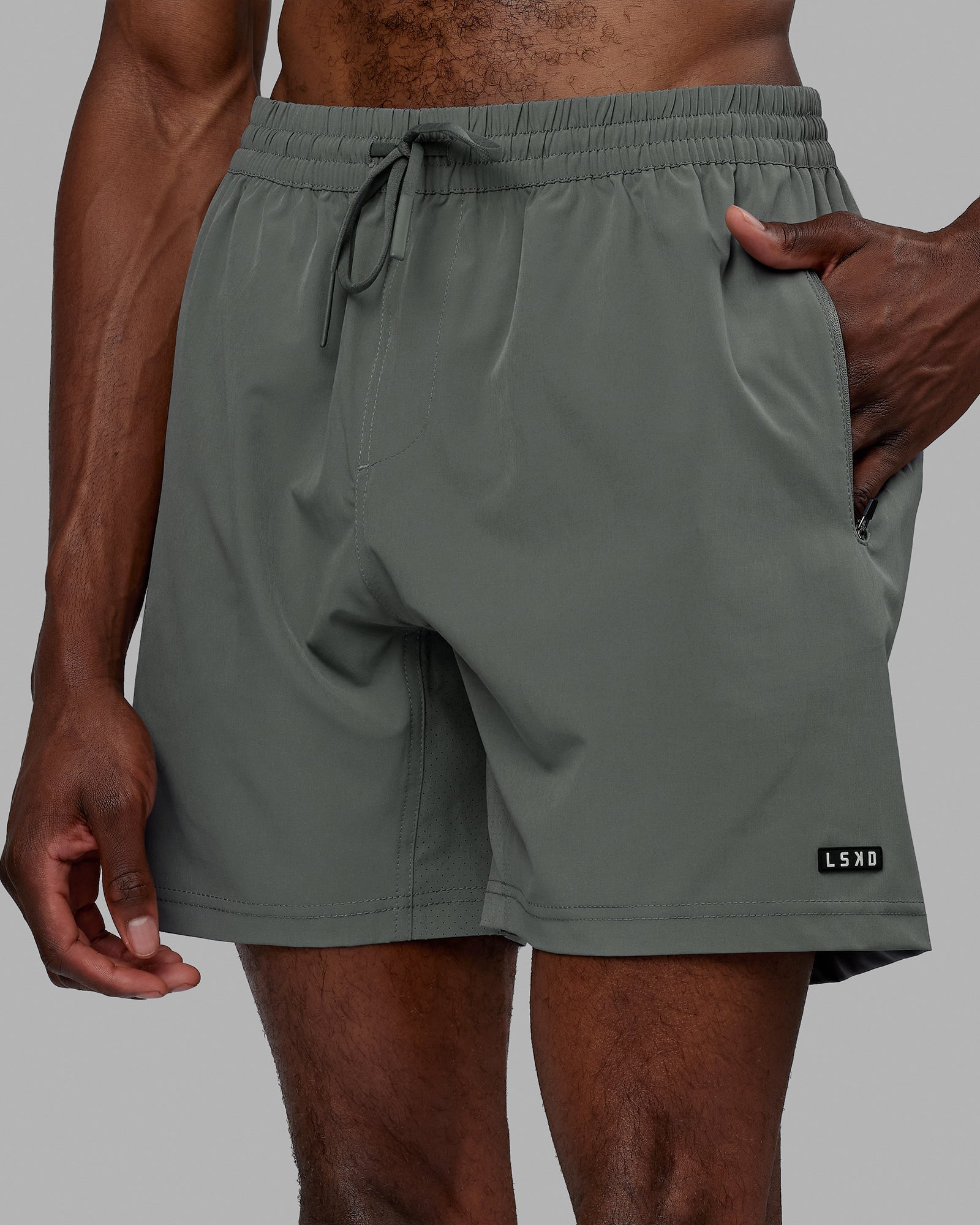 Man wearing Rep 7'' Performance Short - Graphite