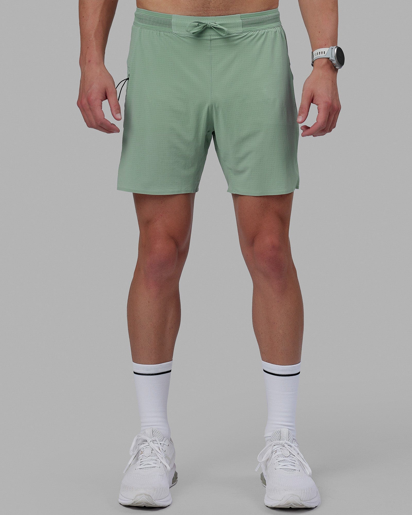 Man wearing UltraAir 6'' Lined Performance Short - Iceberg Green