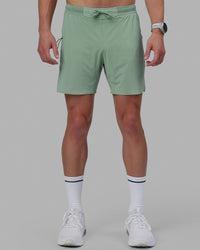 Man wearing UltraAir 6'' Lined Performance Short - Iceberg Green