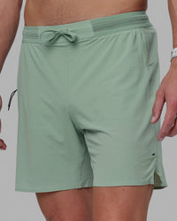 Man wearing UltraAir 6'' Lined Performance Short - Iceberg Green
