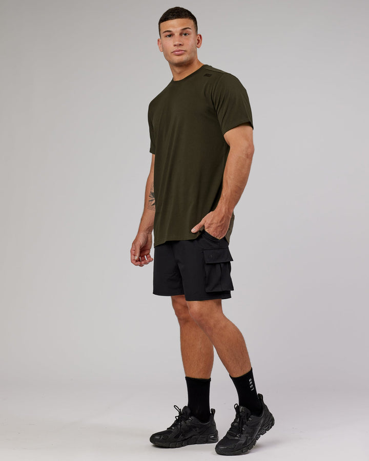 Man wearing Energy Stretch Performance Cargo Short - Black