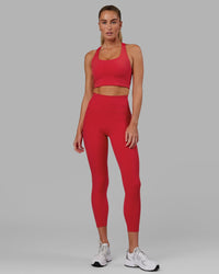 Woman wearing Fusion Ultra High-Rise 7/8 Legging Pockets - Scarlet | Model:Elise | Size:S