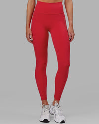 Woman wearing Fusion Ultra High-Rise Full Length Legging Pockets - Scarlet | Model:Elise | Size:S