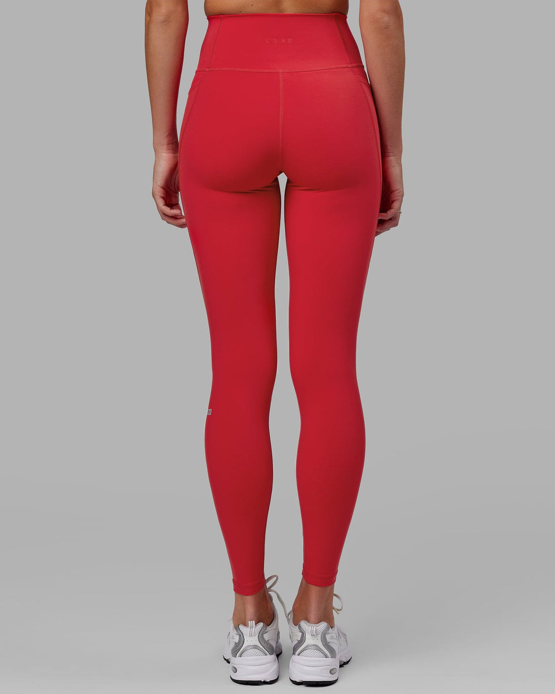 Woman wearing Fusion Ultra High-Rise Full Length Legging Pockets - Scarlet | Model:Elise | Size:S